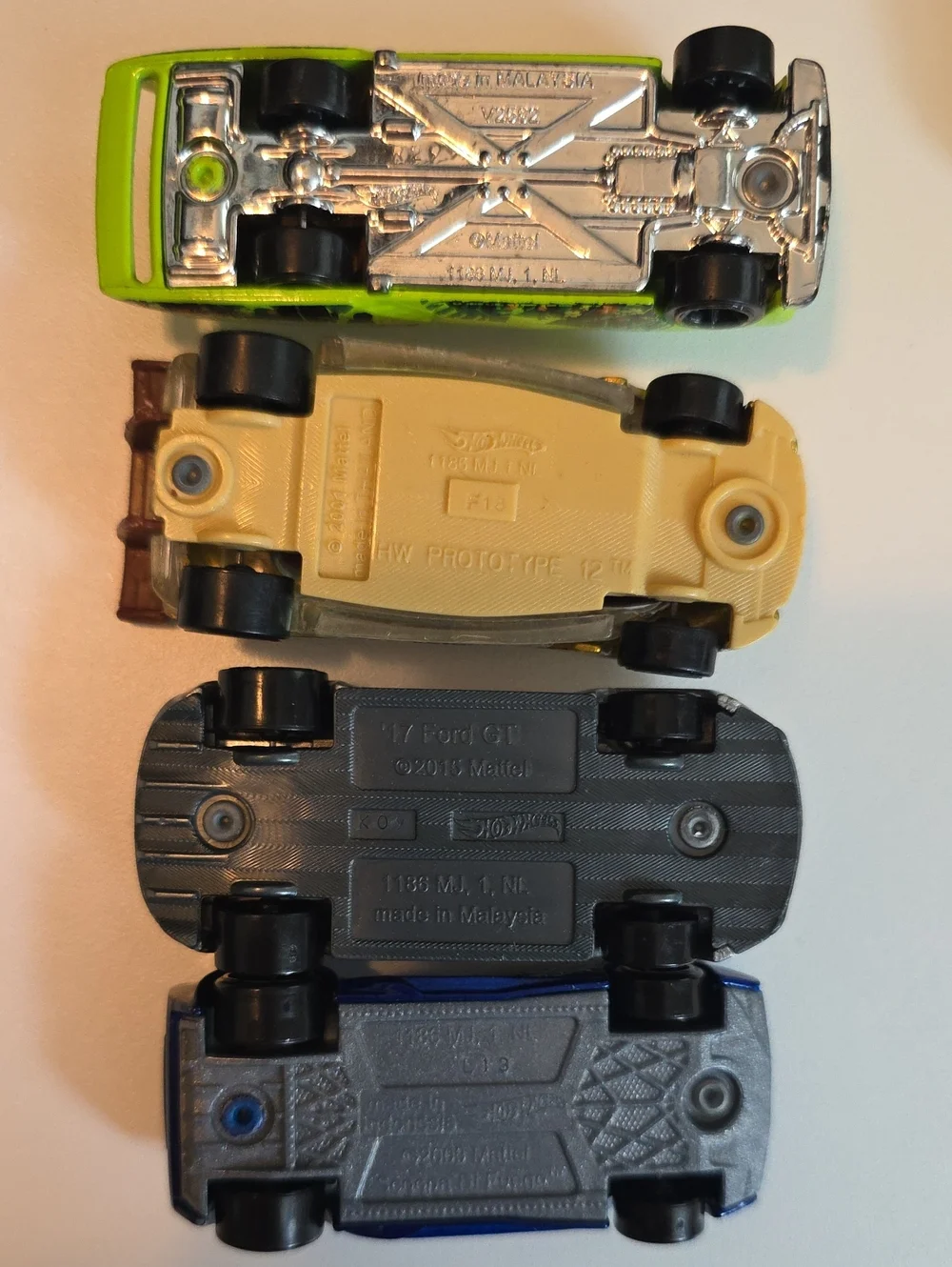 Assorted Hot Wheels Cars - Ford GT, Fast Fish, Mazda RX7, Dodge Charger And More